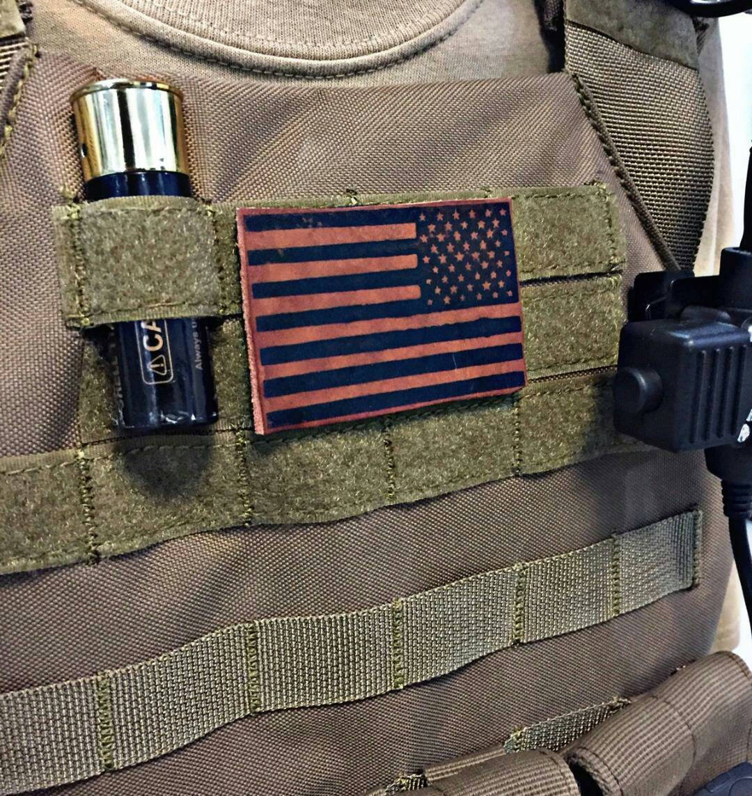 American Flag Fishing Genuine Leather patch sewn on a camouflage